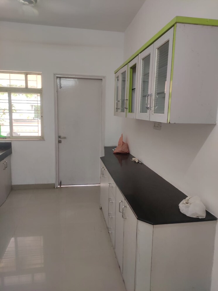 Kitchen, astha-baner 2 Bedroom 950 Sq.Ft. Apartment In Baner Pune 7789458