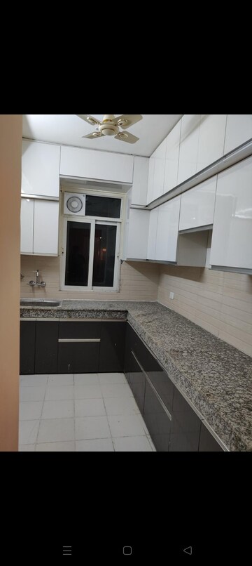 Kitchen in 3 BHK Apartment at Proview Officer City 2, Raj Nagar Extension – for Sale