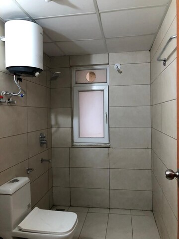 Bathroom in 3 BHK Apartment at Tata Eureka Park, Sector 150 – for Rent