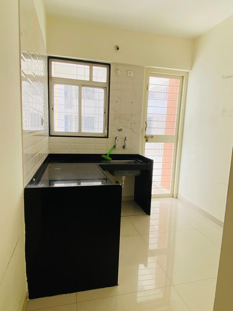 Kitchen, vision-indramegh 2 Bedroom 1100 Sq.Ft. Apartment In Tathawade Pune 7790535