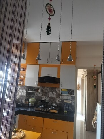 Kitchen in 1 BHK Apartment at Signature Global Synera, Sector 81 – for Sale