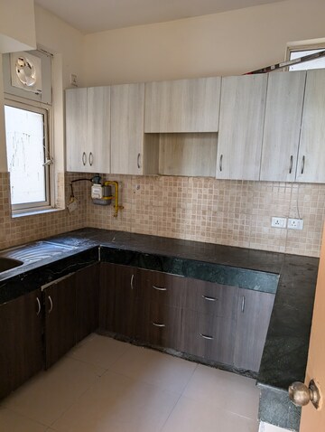 Kitchen in 2 BHK Apartment at Jaypee Greens Kosmos, Sector 134 – for Sale