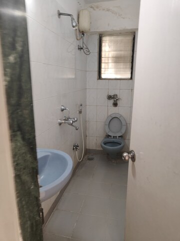 Bathroom in 2 BHK Apartment at Blue Mountain Towers, Shashtri Nagar – for Sale