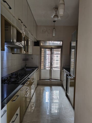 Kitchen in 2.5 BHK Apartment at Oberoi Springs, Andheri West – for Rent