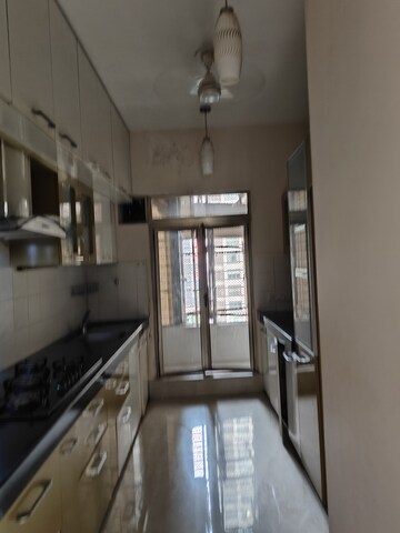 Kitchen in 2.5 BHK Apartment at Oberoi Springs, Andheri West – for Sale