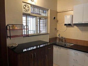 Kitchen in 3 BHK Apartment at Kolte Patil Elburz Hills & Dales , Nibm – for Rent