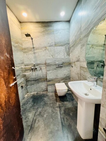 Bathroom in 3 BHK Builder Floor at Dhakoli Village – for Sale