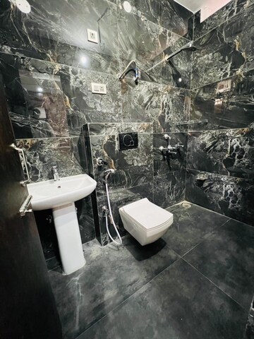 Bathroom in 3 BHK Builder Floor at Dhakoli Village – for Sale