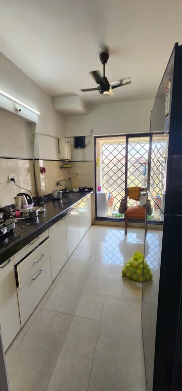 Kitchen in 3 BHK Apartment at Dheeraj Valley, Goregaon East – for Sale