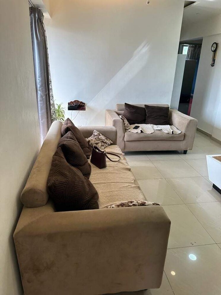 Living Room, amanora-future-towers 1 Bedroom 610 Sq.Ft. Apartment In Hadapsar Pune 7792148