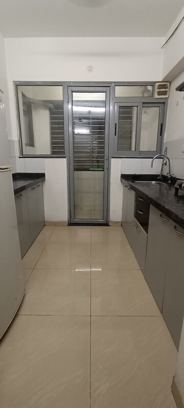 Kitchen in 1.5 BHK Apartment at Amanora Future Towers, Hadapsar – for Sale
