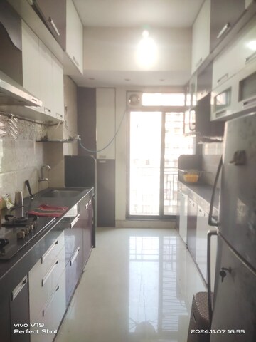 Kitchen in 2 BHK Apartment at Seawoods Sector 38 – for Rent