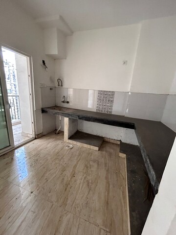 Kitchen in 3 BHK Apartment at Shri Radha Aqua Garden, Sector 16b Greater Noida – for Sale