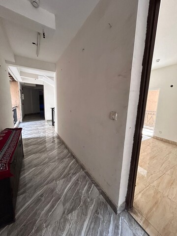 Building Lobby in 3 BHK Apartment at Shri Radha Aqua Garden, Sector 16b Greater Noida – for Sale