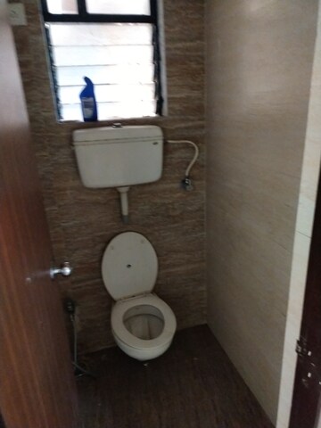 Bathroom in 1 BHK Apartment at Raunak City, Kalyan West – for Sale
