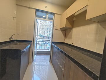 Kitchen in 1 BHK Apartment at JP North Alexa, Mira Road – for Sale