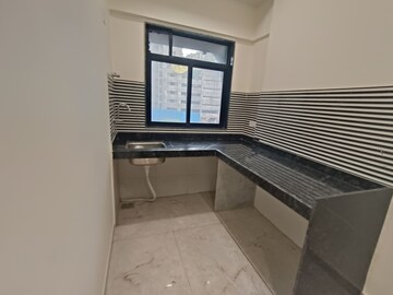 Kitchen in 2 BHK Apartment at Maruti Towers, Kandivali East – for Sale