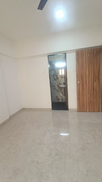 Master Bedroom in 1.5 BHK Apartment at Borivali West – for Sale