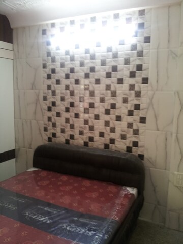 Room in 1 BHK Apartment at Tarang CHS Andheri, Andheri West – for Rent