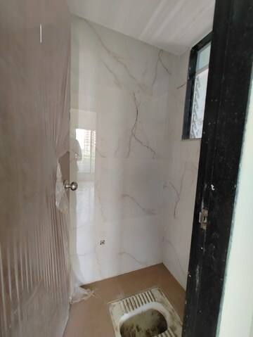 Bathroom in 2 BHK Apartment at Om Sai Riddhi Siddhi Exotica, Ulwe – for Rent