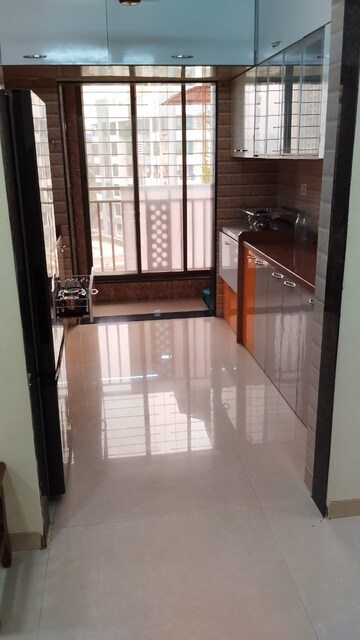 Kitchen in 2 BHK Apartment at Shreeji Towers Apartment, Mira Road – for Sale