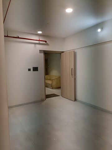 Living Room in 1 BHK Apartment at Trishabh Greens, Chembur – for Sale