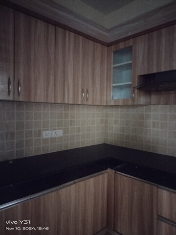 Kitchen in 2.5 BHK Apartment at Mahagun Mywoods, Sector 16c Greater Noida – for Sale