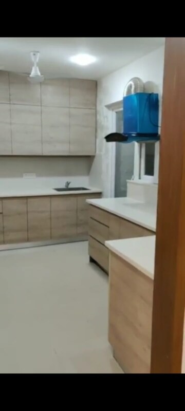 Kitchen in 2.5 BHK Apartment at Amrapali Princely Estate, Sector 76 – for Sale