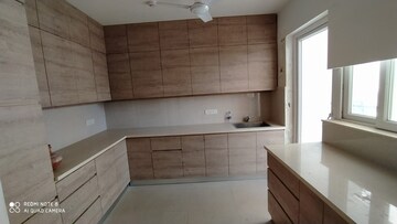 Kitchen in 2.5 BHK Apartment at Amrapali Princely Estate, Sector 76 – for Sale