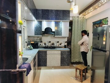 Kitchen in 2 BHK Apartment at ROF Aalayas, Sector 102 – for Sale