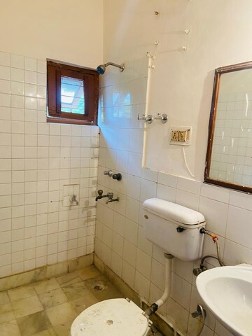 Bathroom in 2 BHK Apartment at Arun Vihar Sector 37, Sector 37 – for Sale
