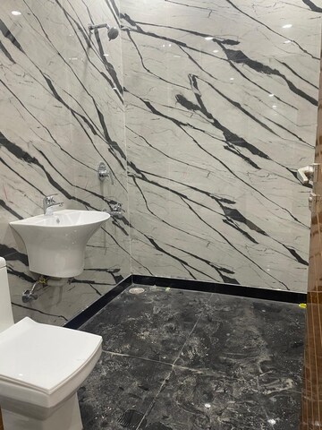 Bathroom in 3 BHK Apartment at Express Garden, Vaibhav Khand – for Sale