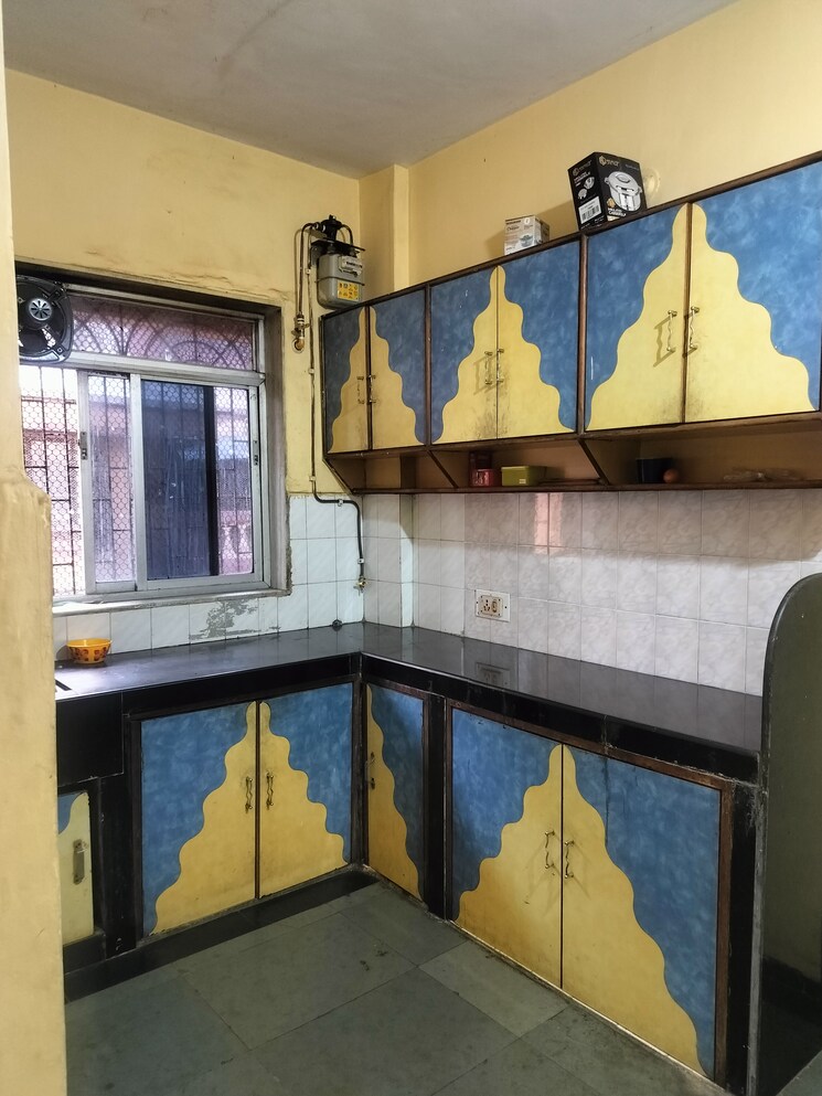 Kitchen, twin-corner 2 Bedroom 650 Sq.Ft. Apartment In Nerul Navi Mumbai 7798551