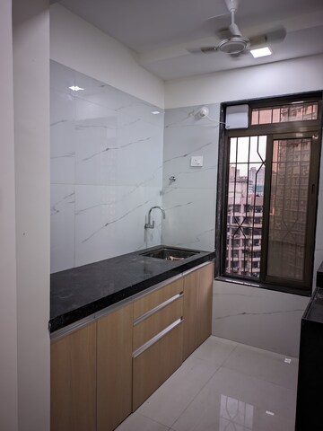 Kitchen in 2 BHK Apartment at Adityaraj Breeze, Vikhroli East – for Rent
