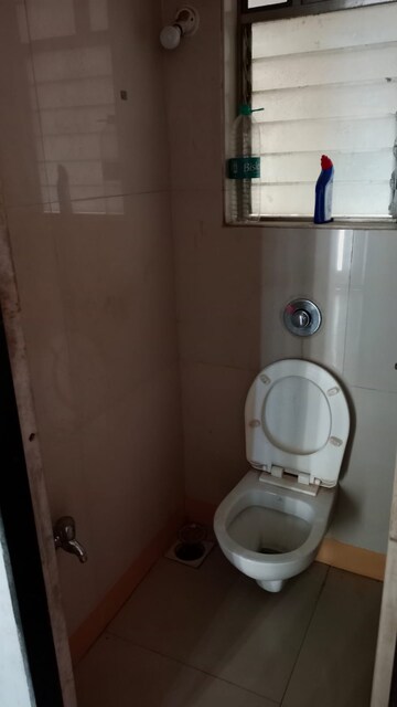 Master Bedroom in 1 BHK Apartment at Unicorn Global Arena, Naigaon East – for Rent