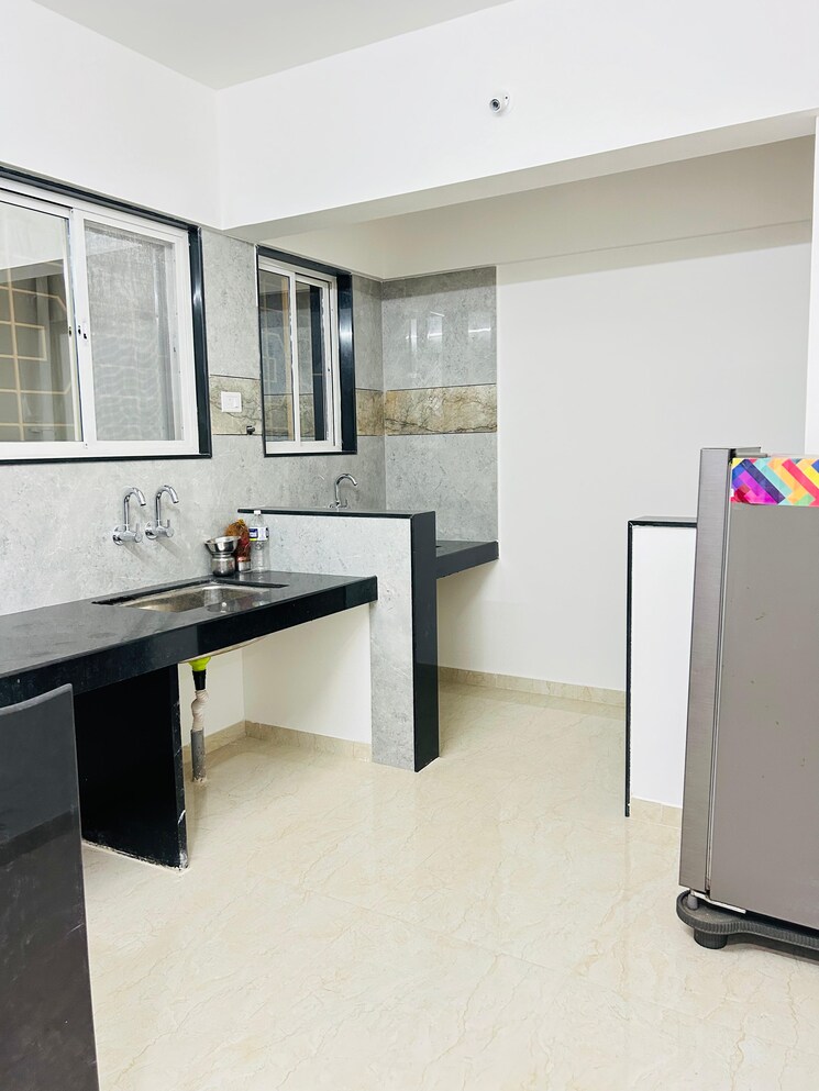 Kitchen, pantheon-acorn-park-phase-1 2 Bedroom 795 Sq.Ft. Apartment In Wakad Pune 7798941