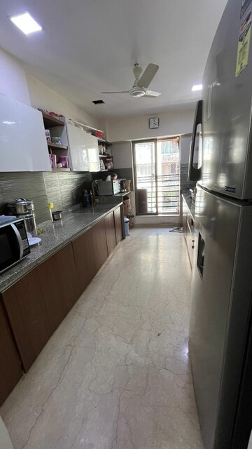 Kitchen in 3 BHK Apartment at Dheeraj Serenity, Santacruz West – for Sale