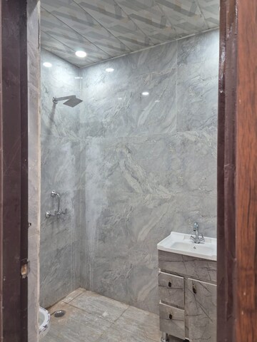 Bathroom in 2 BHK Apartment at Amrapali Green, Vaibhav Khand – for Sale
