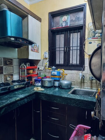 Kitchen in 2 BHK Builder Floor at Arjun Nagar – for Sale