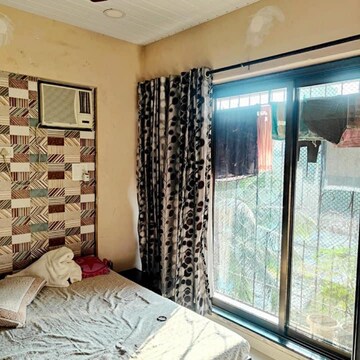 Bedroom in 1 BHK Apartment at Vishnu Apartment Naigaon, Tivri – for Sale