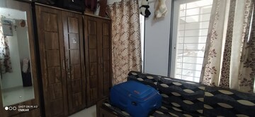 Living Room in 1 BHK Apartment at Padmanabh Golden Valley, Dhayari – for Sale