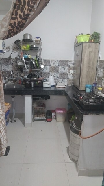 Kitchen in 1 BHK Apartment at Signature Global Synera, Sector 81 – for Sale