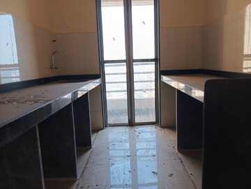 Kitchen in 2 BHK Apartment at Hubtown Greenwoods, Vartak Nagar – for Sale