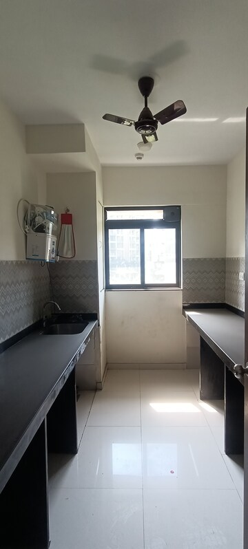 Kitchen in 2 BHK Apartment at Lodha Casa Maxima, Mira Road East – for Sale