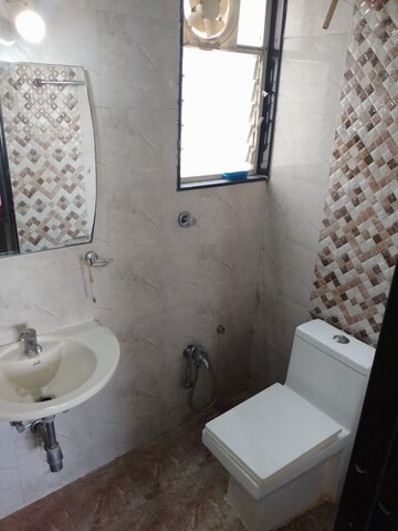 Bathroom in 2.5 BHK Apartment at Mhada Colony – for Rent