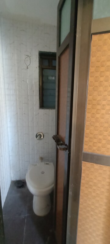 Bathroom in 1 BHK Apartment at Ideal Enclave, Mira Road – for Sale