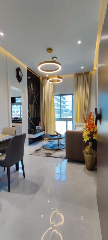 Living Room in 1 BHK Apartment at Unique Sky City, Nilemore – for Sale