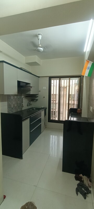 Kitchen in 1 BHK Apartment at Unique Orbit I, Mira Road – for Sale