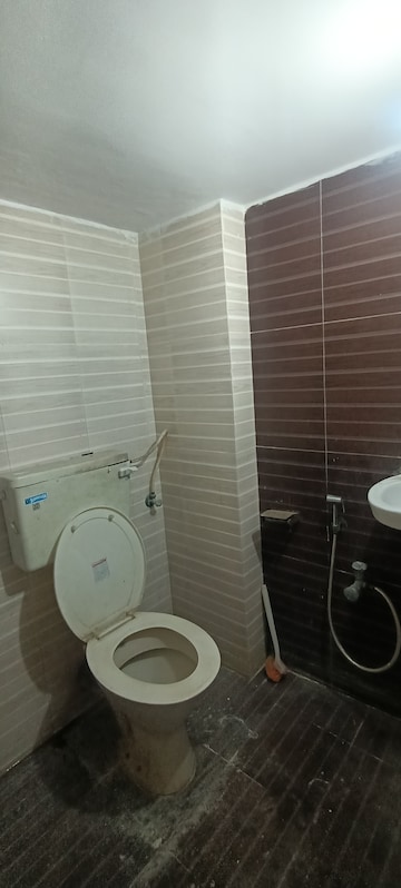 Bathroom in 1 BHK Apartment at Paradigm Twinstar, Mira Road – for Sale