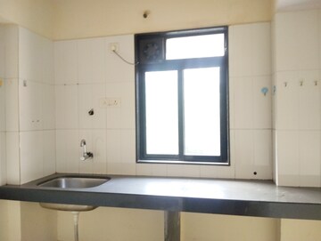 Kitchen in 1 BHK Apartment at Raunak City Phase 3, Kalyan West – for Sale